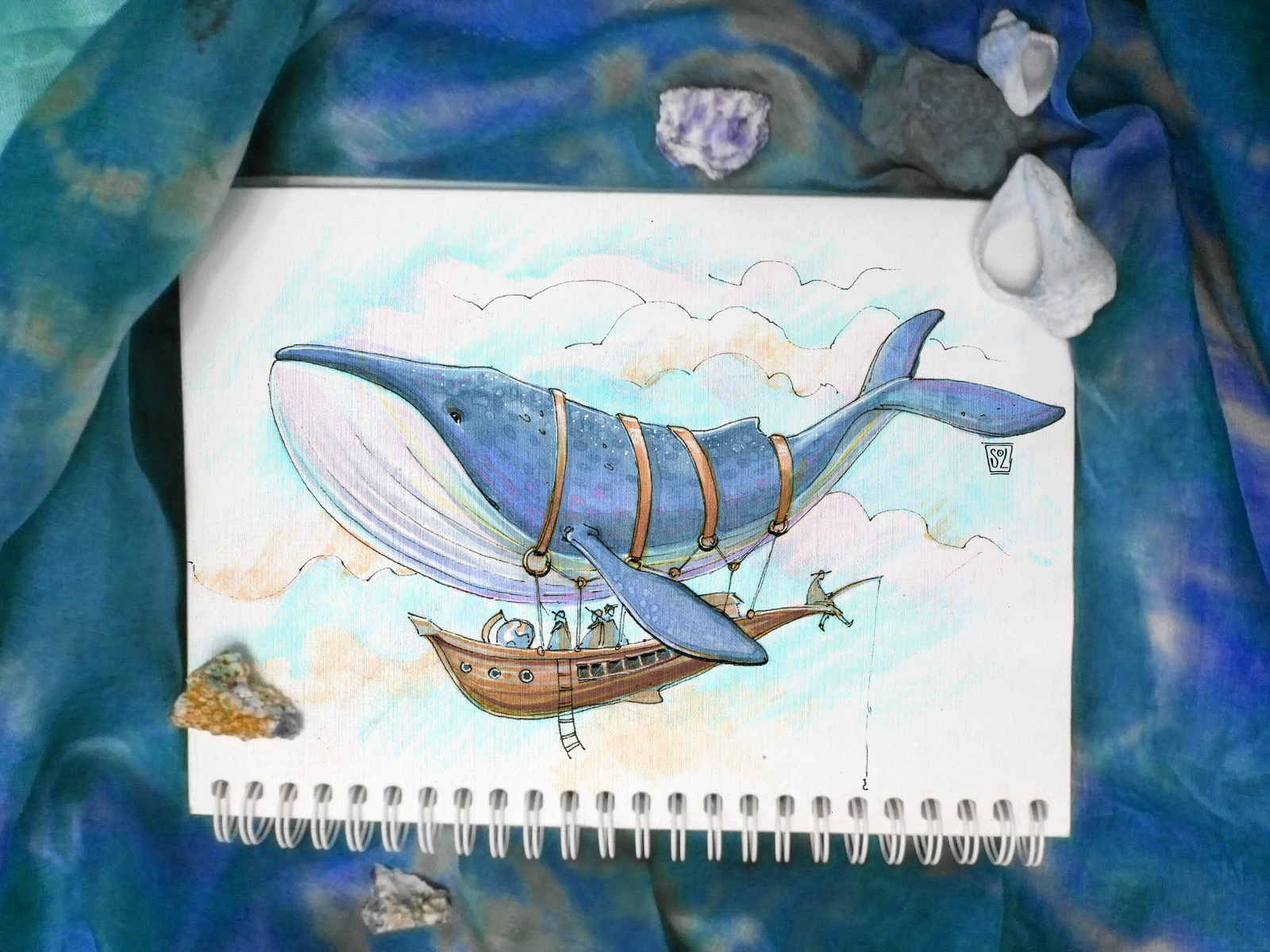 Папа кит рисует карандашами